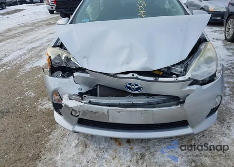 2013 Toyota Prius C Two z USA, uszkodzony, nr VIN JTDKDTB39D1534362